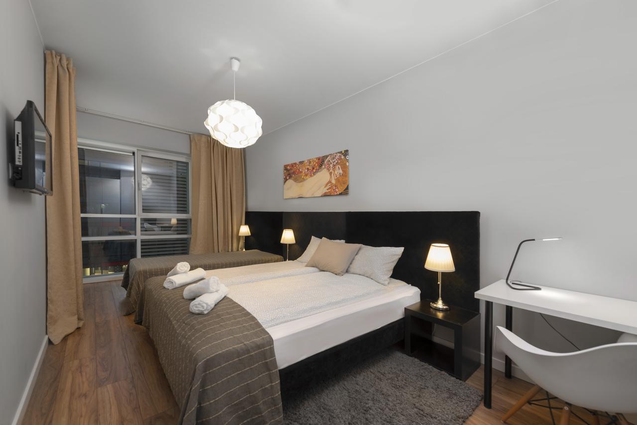 Apartamenty Towarowa Познань Экстерьер фото
